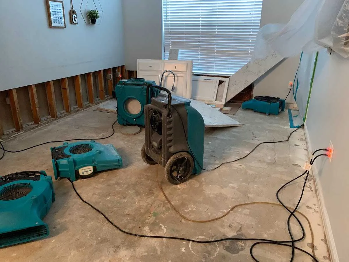 Dehumidifier in flood-cut room for Water Damage Restoration in Garnet